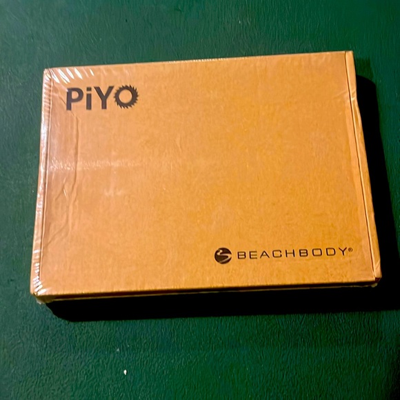 Piyo workout videos never used or opened. In original packaging. - Picture 1 of 3
